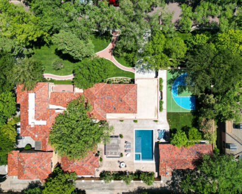 Overview of pool and basketball backyard